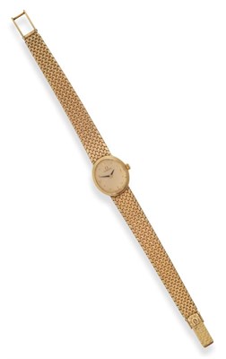 Lot 2189 - A Lady's 9ct Gold Wristwatch, signed Omega, circa 1980, quartz movement, champagne coloured...