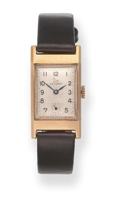 Lot 2192 - A 9ct Gold Rectangular Wristwatch, signed Record, 1956, lever movement, silvered dial with...