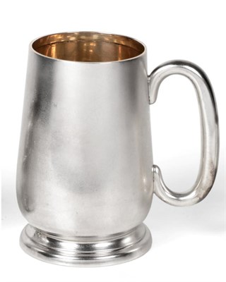 Lot 2225 - A Silver Mug, Joseph Gloster Ltd, Birmingham 1937, plain tapering with tucked in base and on...