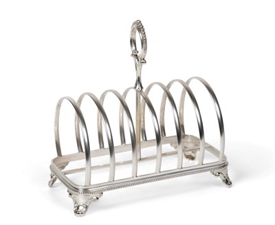 Lot 2234 - A Victorian Silver Toast Rack, Henry Holland, London 1875, rectangular with arched divisions,...