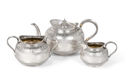 Lot 2254 - A Late Victorian Bachelor's Silver Three Piece Tea Service, Martin & Hall, London 1893,...