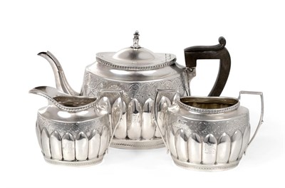 Lot 2260 - A Victorian Silver Three Piece Tea Service, James Henry & Herbert Barraclough, Sheffield 1890,...