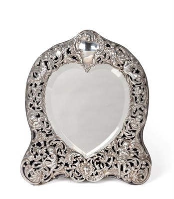 Lot 2266 - A Late Victorian Silver Heart Shaped Mirror, William Comyns, London 1896, the mount pierced and...