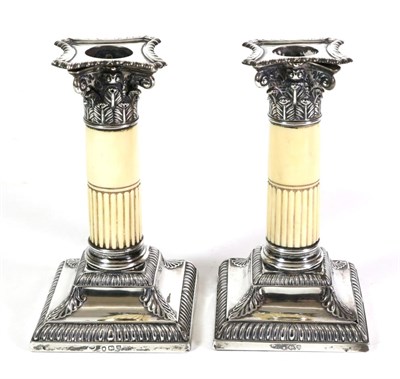 Lot 2274 - A Pair of Late Victorian Silver and Carved Ivory Corinthian Column Candlesticks, Thomas...