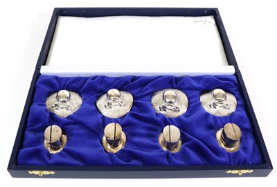 Lot 2281 - Two Sets of Four Modern Novelty Silver Place Card Holders,  four modelled as a lady's hat, Mappin &