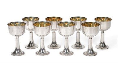 Lot 2303 - A Set of Eight Silver Goblets, probably Thomas Fattorini, Sheffield 1972, the plain bowl with...