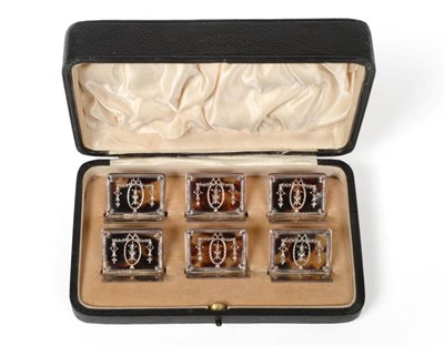 Lot 2375 - A Set of Six Silver and Tortoiseshell Menu Card Holders, William Comyns, London 1906/10,...