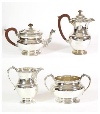 Lot 2381 - A Four Piece Silver Tea Service, Collingwood & Sons, Birmingham 1934, circular with Celtic knot...