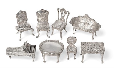 Lot 2393 - A Group of Continental Silver Miniature Furniture, various dates and makers, all with English...