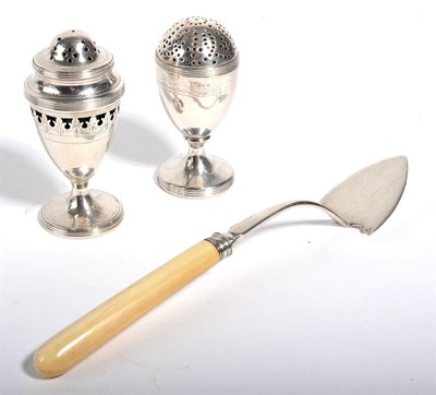 Lot 2413 - A George III Silver Butter Spade, Henry Chawner, London 1792, with ivory handle; and Two George III