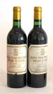 Lot 2070 - Chateau Pichon Longueville Comtesse de Lalande 1983, Pauillac (x2) (two bottles) U: into neck