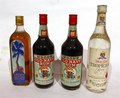 Lot 2230 - Woods Old Navy Demerara Rum, circa 1940s, 26 2/3 fl ozs, 100 proof (x2); White Gold Tropicana...