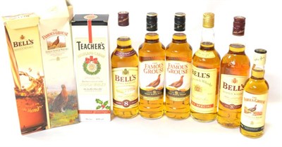 Lot 2276 - The Famous Grouse, Finest Scotch Whisky, 70cl 40% (x3); Another, half bottle; Bells 8 Year Old,...