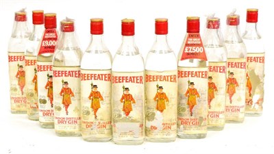 Lot 1208 - Beefeater London Distilled Dry Gin, circa 1980's, 26 2/3fl fl ozs, 70 proof (x11) (eleven bottles)