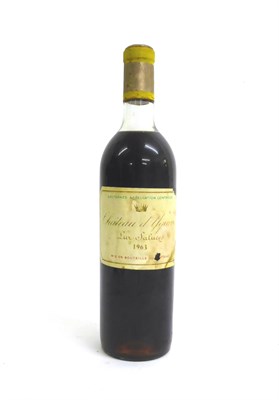 Lot 2100 - Chateau d'Yquem 1963, Sauternes U: upper shoulder, contents appears oxidised and a ruby colour,...