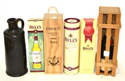 Lot 2397 - A Mixed Parcel Comprising: Bells 8 Year Old (x3); Moet & Chandon NV; Croft 1983 LBV; a leather...