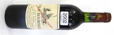 Lot 2002 - Chateau Beychevelle 1982, St Julien  U: very top shoulder, small nicks to capsule