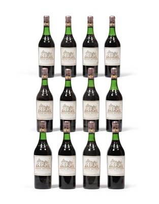 Lot 2025 - Chateau Haut-Brion 1970, Pessac-Leognan, owc (twelve bottles) U: removed from sealed owc to...