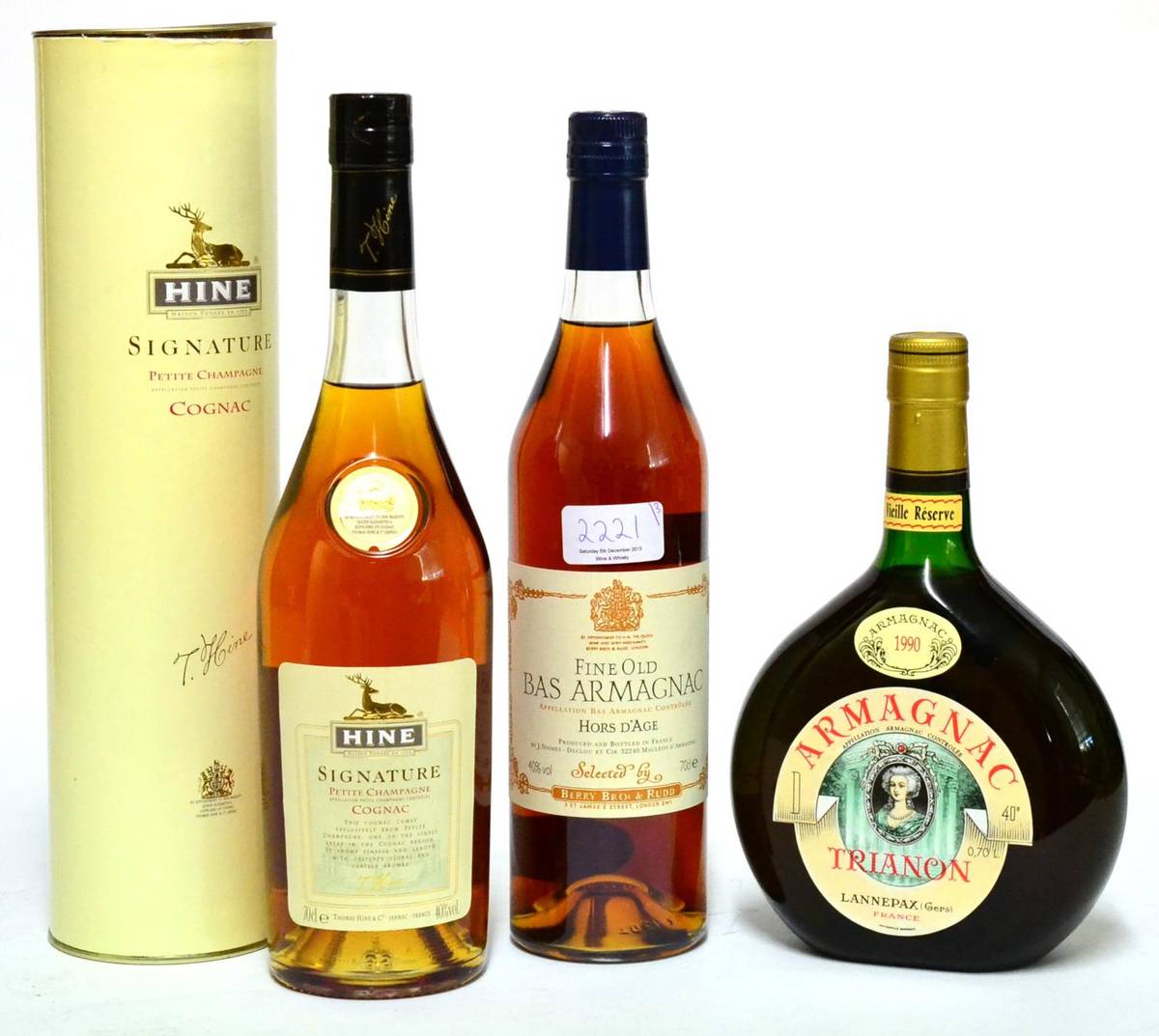 Lot 2221 - HINE Signature Petite Champagne Cognac, in original tube; Trianon 1990 Armagnac; Berry Brothers...