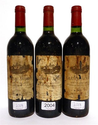 Lot 2004 - Chateau Ausone 1983, Saint-Emilion Grand Cru (x3) (three bottles) U: into neck, very bin soiled...