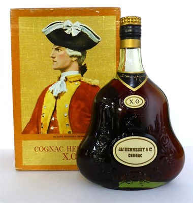 Lot 2206 - Hennessy XO (Old Style Label and Box), 24fl ozs, 70 proof, in original carton U: seal cut...