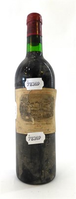 Lot 2068 - Chateau Lafite Rothschild 1979, Pauillac U: into neck, label torn in half, very poor label