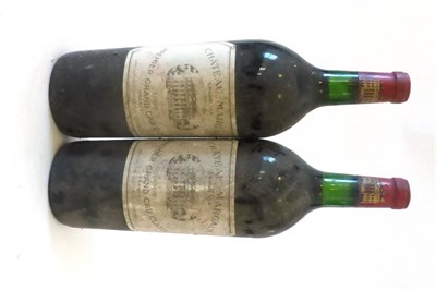 Lot 2111 - Chateau Margaux 1969, Margaux, magnum (x2) (two magnums) U: into neck, soiled labels, nicked...