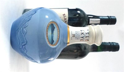 Lot 2352 - Blandy's Bual Madeira 1964; Cockburn 1963; Isle of Skye 21 Year Old Decanter (three bottles)