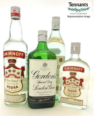 Lot 2418 - A Mixed Parcel Comprising: Gordons Gin (x3); 1980's Smirnoff Vodka (x3); Bacardi Light Dry...