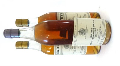 Lot 2443 - Harveys Petite Champagne Cognac 1944, landed 1964, bottled 1969, 24fl ozs, 70 proof; Harveys Petite