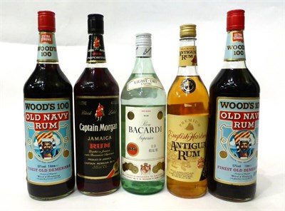 Lot 2184 - A Mixed Parcel of Rum Comprising: Wood's 100, litre, 57%, (x2); Captain Morgan, litre, 40%; English