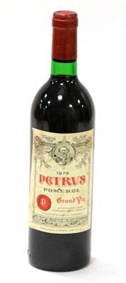 Lot 2099 - Petrus 1979, Pomerol U: just into neck, a few nicks to label, stain to top right of label