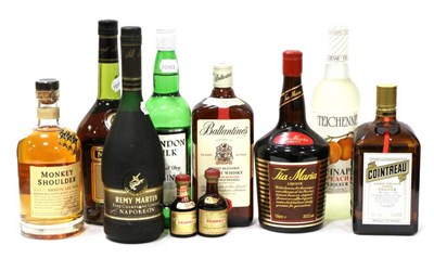 Lot 2334 - A Mixed Parcel Including: Cointreau, Ballantine's Finest Blended, London Silk Gin, Martell VS,...