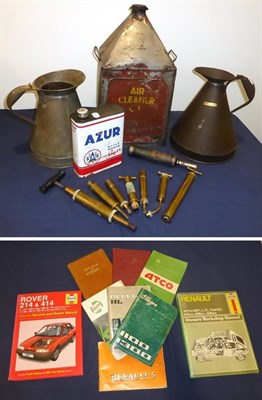 Lot 2045 - A Collection of Car Automobilia including four vintage oil cans, 1 gallon measuring jug, eight...