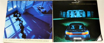 Lot 2039 - Three Porsche Calendars, dated 1990 with bronzed Porsche Carrera medallion, 1991 with bronzed...