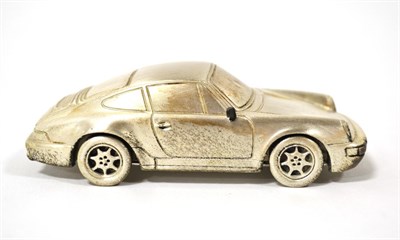 Lot 2012 - Porsche Interest: A Scale Model of a Porsche 911, the base stamped STERLING 925, with perspex...