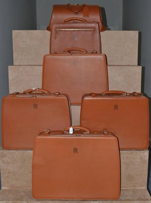 Lot 2017 - Rolls-Royce Interest: A Brown Leather Six Piece Luggage Set, by Swaine & Adeney, circa 1997,...