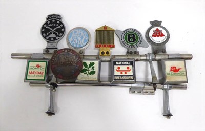 Lot 2028 - Ten Car Badges, formerly fitted to a Ford V8 Pilot, to include a rare M.O.T.H., The Caravan...