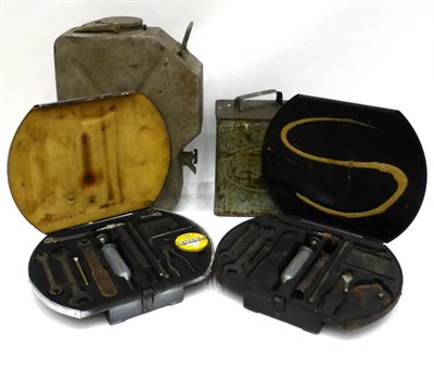 Lot 2040 - Two 1950's Jaguar Tool Kits, in metal cases, one complete with grease gun, adjustable spanner,...