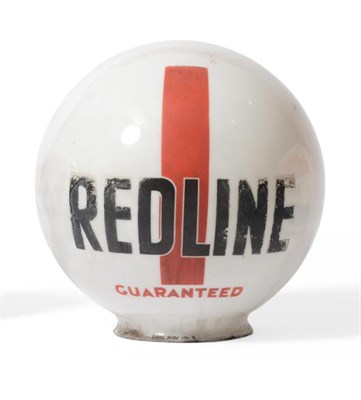 Lot 2047 - A Vintage Red Line Petrol Pump Globe with black printed red line lettering, against a red...