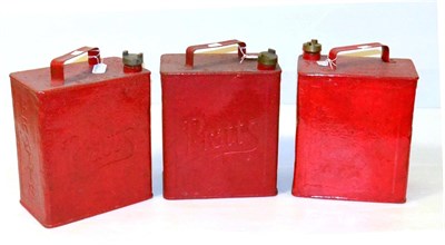 Lot 2039 - Three Vintage Red Painted Fuel Cans, stamped Pratts; three 1930s circular tax disc holders; a...