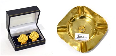 Lot 2054 - A Shell Brass Counter Top Ashtray, the centre with a small yellow enamel plaque ";Shell Motor...