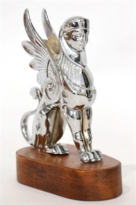 Lot 2083 - A 1930s Chrome Car Mascot modelled as a Griffin, mounted on a later wooden base, 12cm high  For...