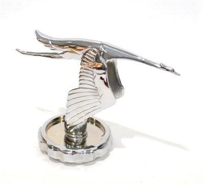 Lot 2089 - An Art Deco Chrome Car Mascot circa 1920 modelled as a bird in flight, the wings down, bolted...