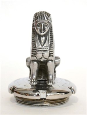 Lot 2090 - A 1920s Chrome Car Mascot in the form of a Sphinx, bolted to a circular radiator cap stamped...