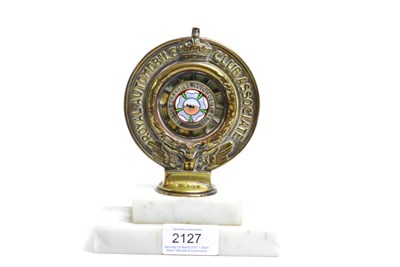 Lot 2127 - A 1917 Elkington & Co Brass and Enamel Car Mascot, the centre enamel formed as a Yorkshire...