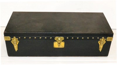 Lot 2161 - A 1920/30s Louis Vuitton Black Leather Brass Nailed Car Trunk, hinged lid, brass carrying...