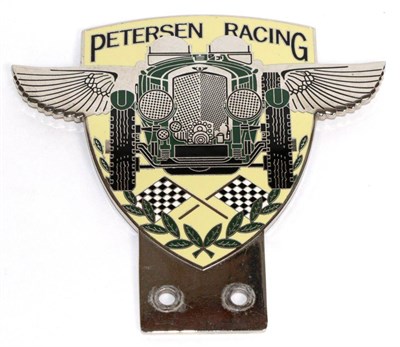 Lot 2015 - A Car Badge Petersen Racing (Bentley) showing a Le Mans racing Bentley with chequered flags and...