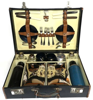 Lot 2026 - A Sirram Black Leather Picnic Case, early 20th century, comprising two chrome plated food...