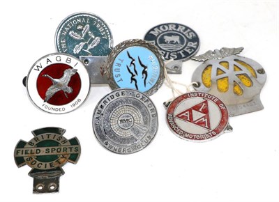 Lot 2038 - Eight Chrome Plated Car Badges, to include a Wagbi red enamel badge, a Wildfowl Trust blue...